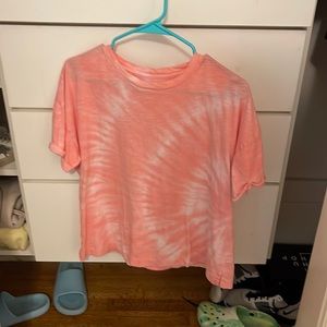 Two shirts size medium one tie dye blue, one tie dye orange!In perfect condition